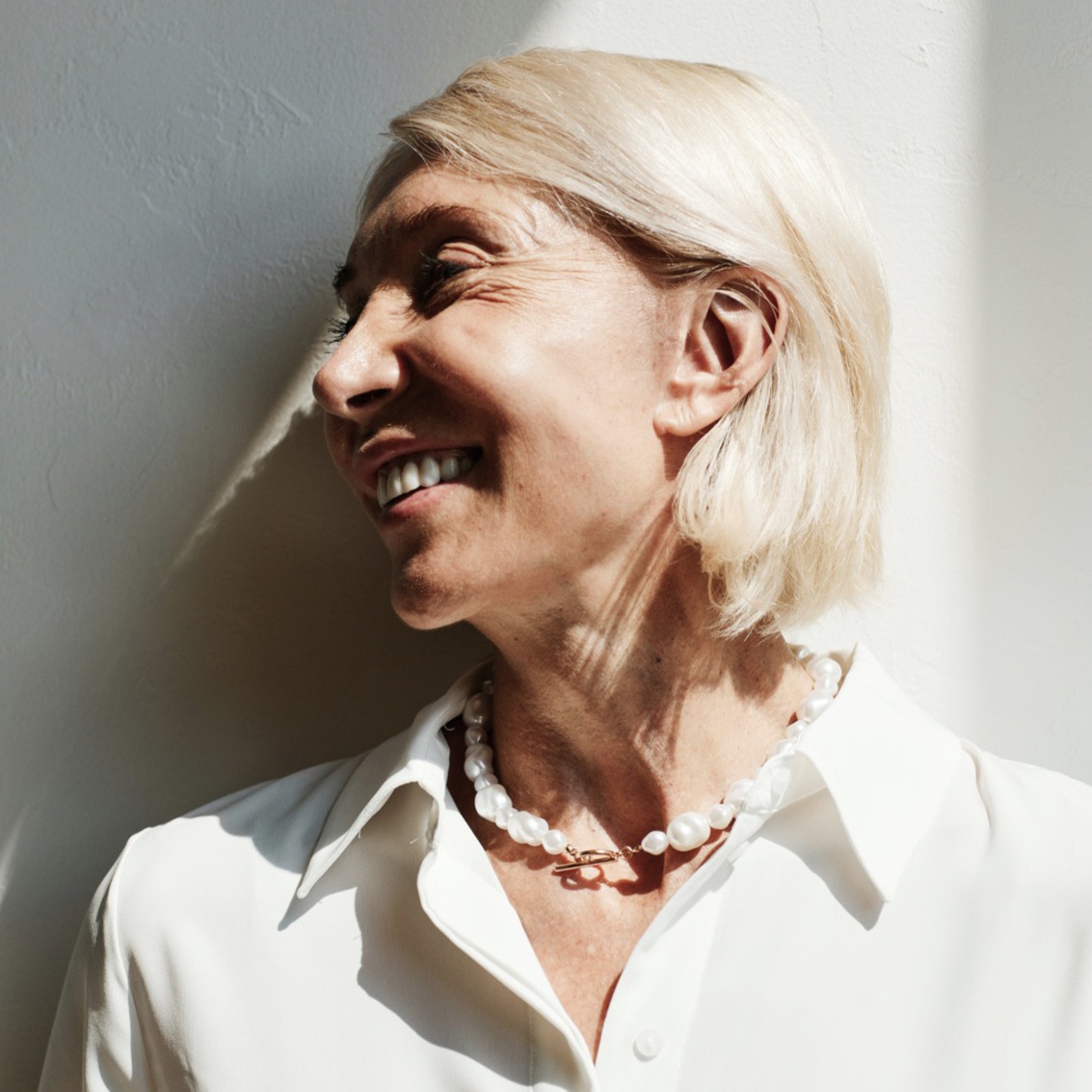 Older woman smiling in the sun